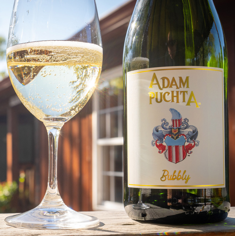 Bottle and glass of Adam Puchta Bubbly